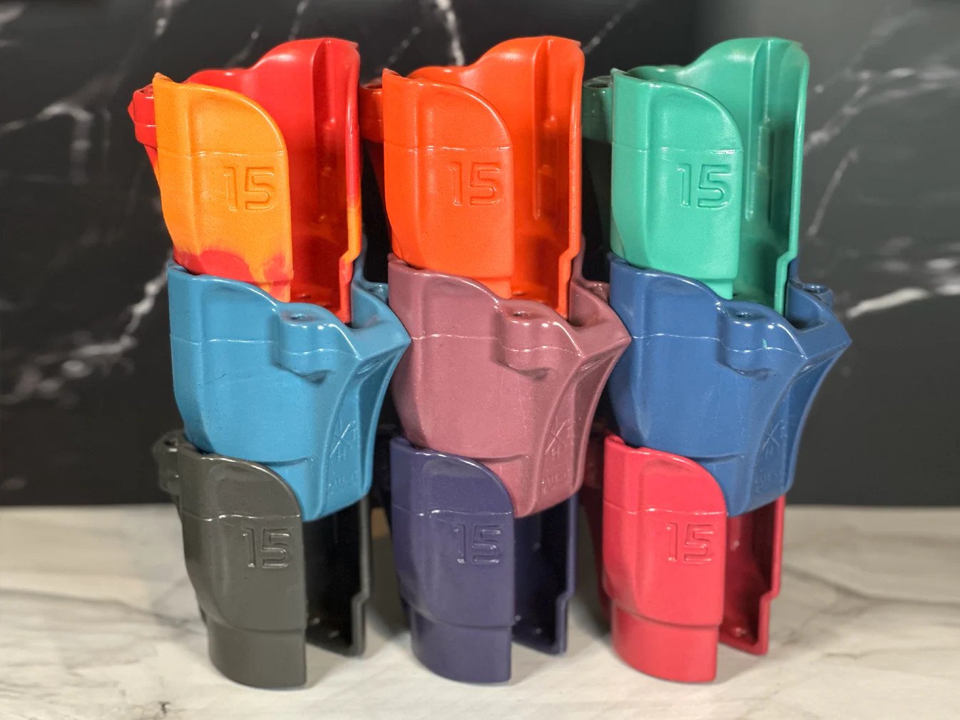 Colorful golf drink-holder accessories arranged on grass